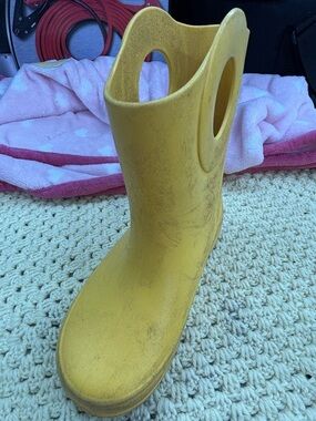 Okabashi mismatched size yellow rubber boots (right is child 12/left is 11)